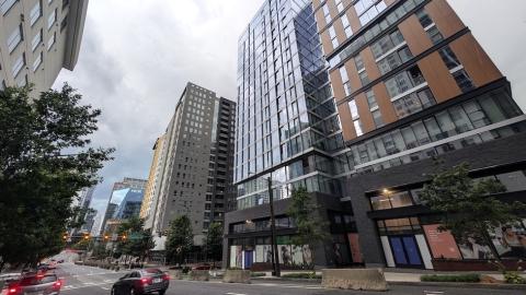  a photo of Midtown Atlanta with many buildings showing how wide streets and perspectives on how many parking lots, vacant parcels have disappeared