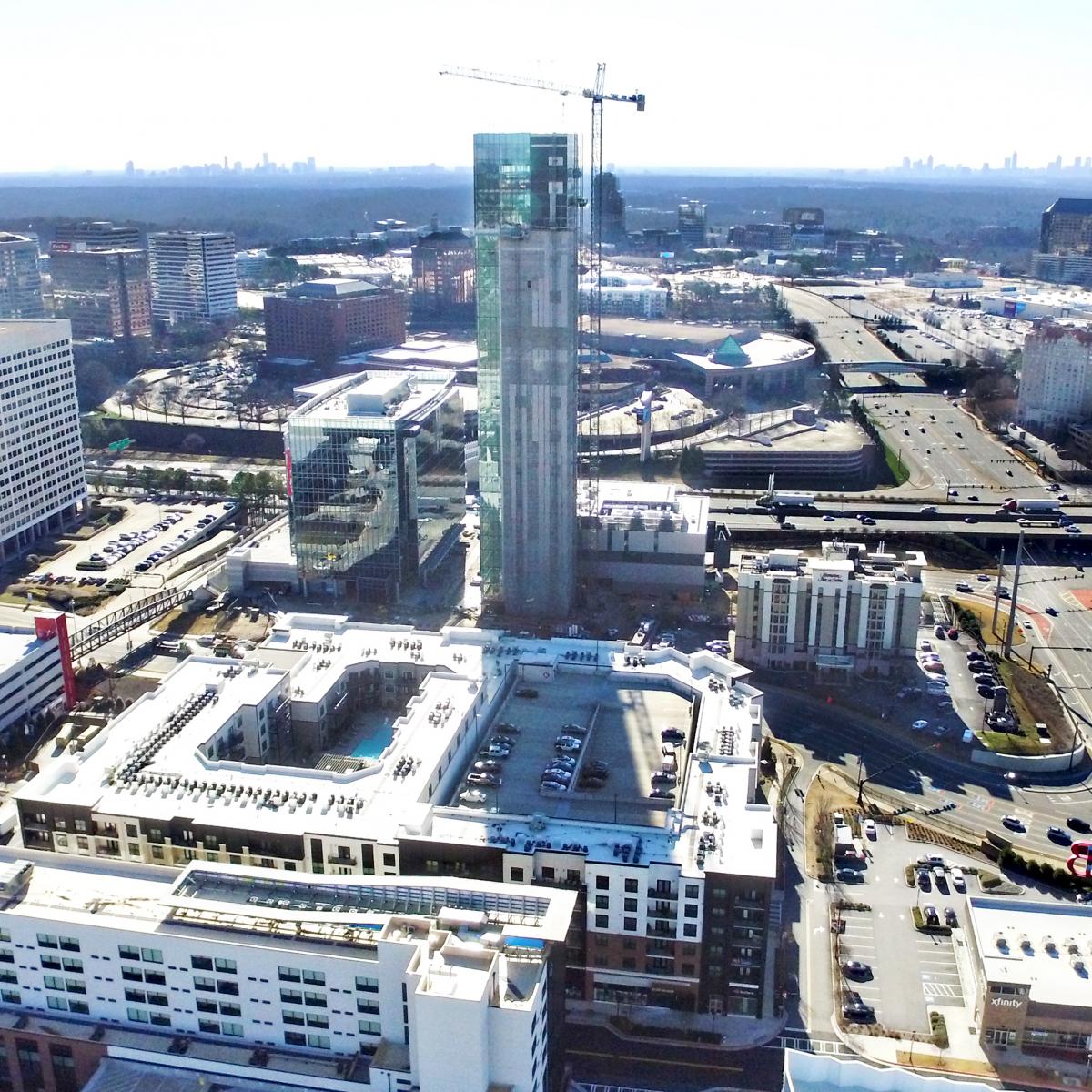 Developer tops out building near Braves stadium